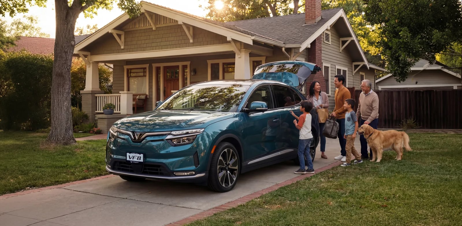 Family loading a blue VinFast VF 8 in a driveway in front of a house